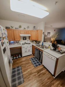 A kitchen with white applicances