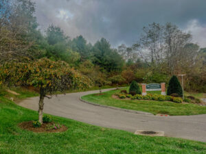 Driveway and sign of apartment community