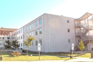 Three story, industrial style apartment complex