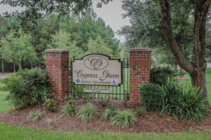 An entrance sign for Cypress Glenn apartments