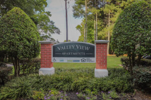 The brick entrance sign for Valley View Apartments