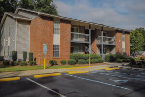 A two story brick apartment building