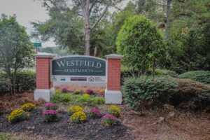 The entrance sign to Westfield Apartments