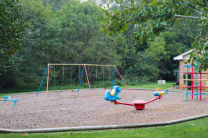 A playground with a swingset