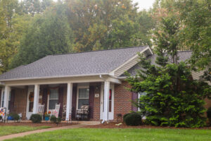 Single story apartment with front porch