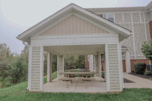 A covered picnic shelter at an apartment complex