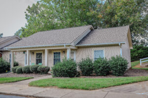 one story building with covered porch