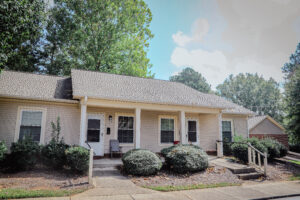 one story building with covered porch