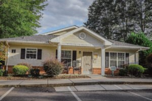 Single story apartment buildings with covered porch