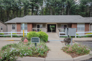 Single story apartment complex and landscaping