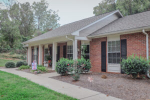 Single story apartment complex and landscaping