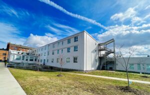 Three story, industrial style apartment complex