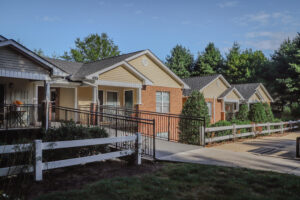 Two story apartment complex with paved walkways