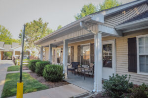 Single story apartment complex with porch