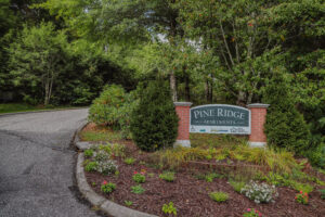 Pine Ridge apartment sign