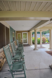 Covered porch with rocking chairs