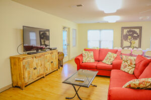 Couches and TV in community room