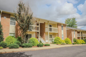 Two story apartment complex with porches off of each unit