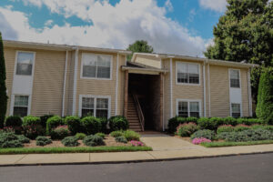 Two story apartment with landscaping