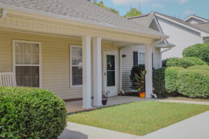 Single story apartment with front porch