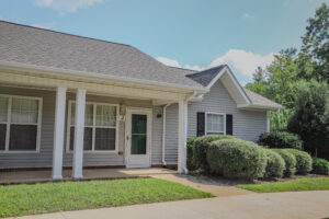 Single story apartment with front porch