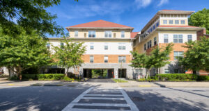 Apartment complex with landscaping and trees