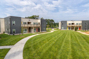 Apartment complex with large grass area