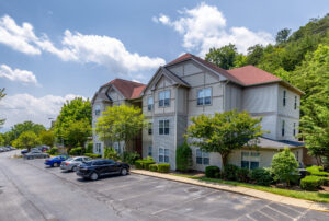 Apartment complex with landscaping and trees