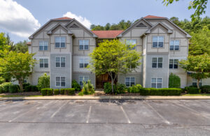 Apartment complex with landscaping and trees