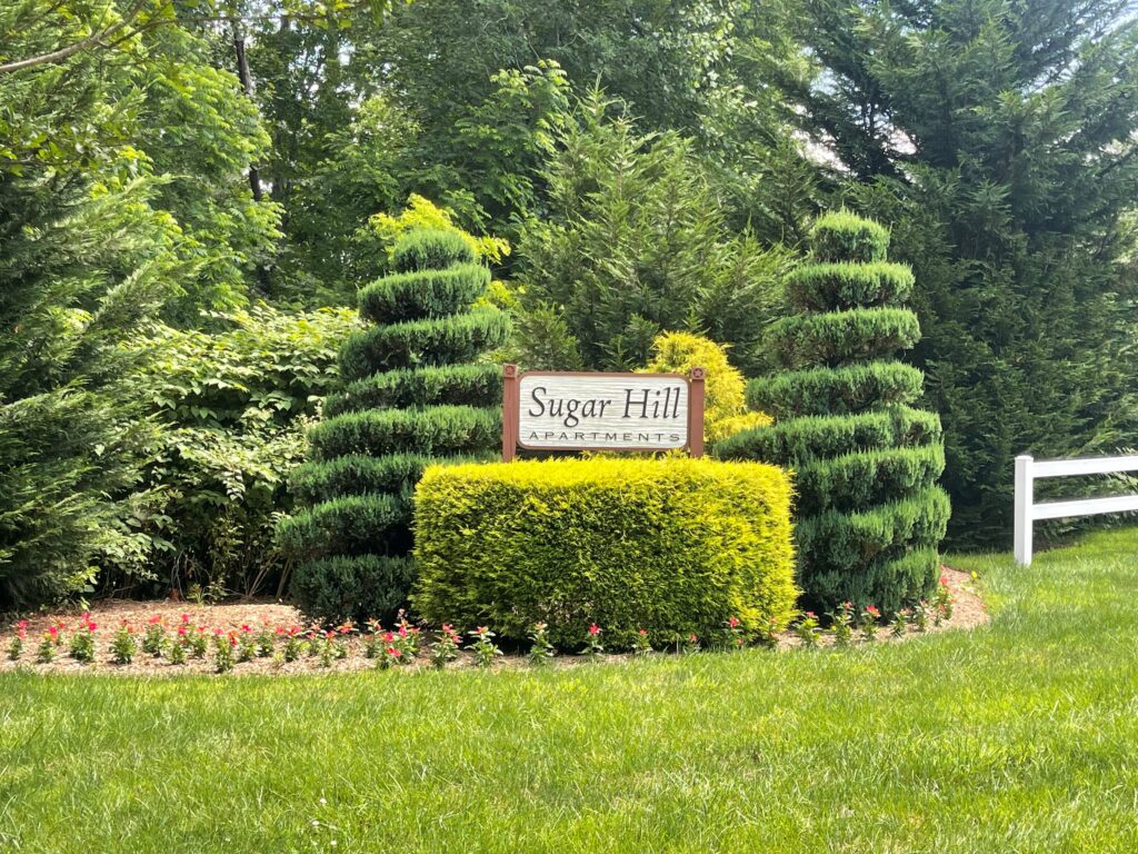 apartment sign and land scaping