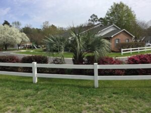 Fence, landscaping, buildings