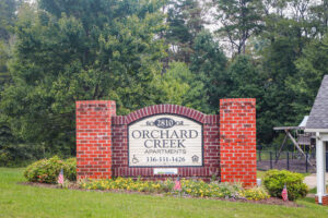 Orchard Creek Apartment Complex Sign