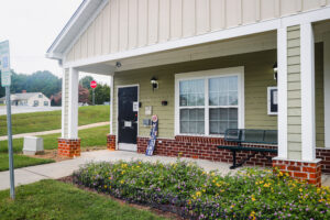 Front office building with bench and covered patio