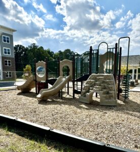 A large playground with blue skies