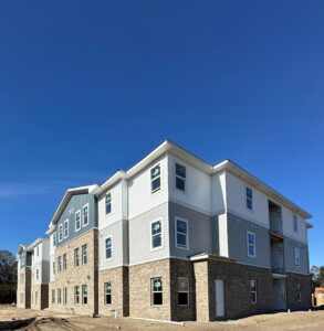 A three story apartment building under construction