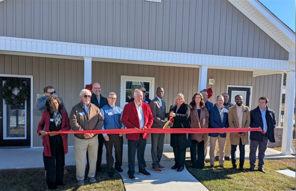 A ribbon cutting for the opening of Riverstone Crossing at the Neuse.